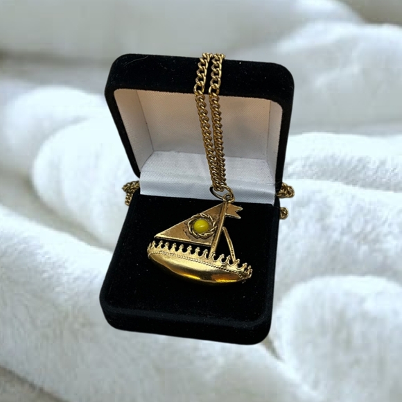 Jewelry - .Gold Tone Reversible Sailboat with Gold Tone Chain